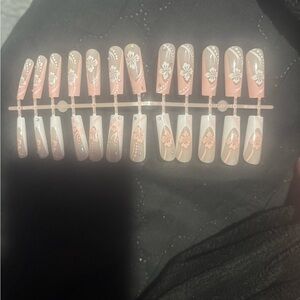 Floral Press-On Nails in 1/2 Blush and 1/2 White French with floral design